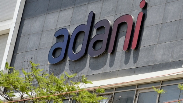 Abu Dhabi's IHC Sells Shares in Adani Green Energy and Adani Transmission: A Tactical Decision